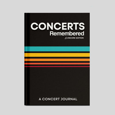 Concerts Remembered Encore Edition hardcover concert journal showcasing a sleek black cover with colorful stripes.